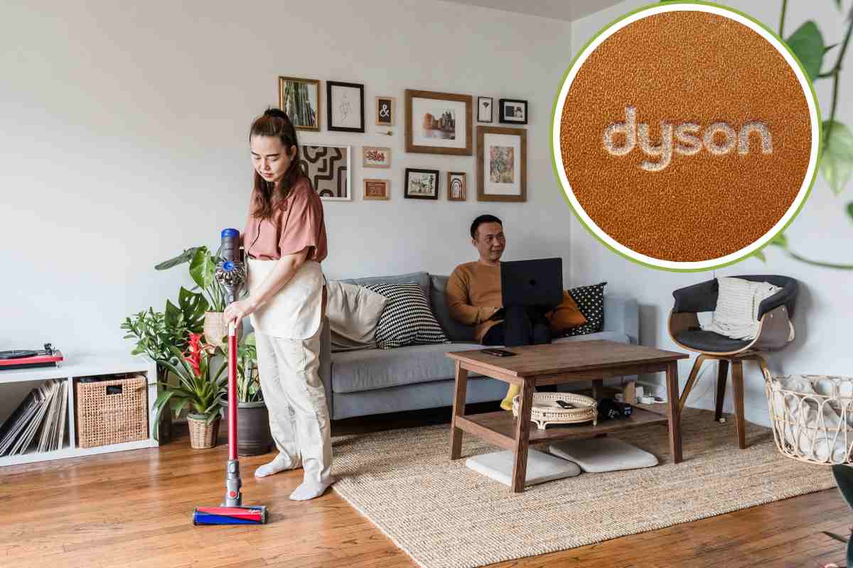 donna che passa aspirapolvere e logo dyson