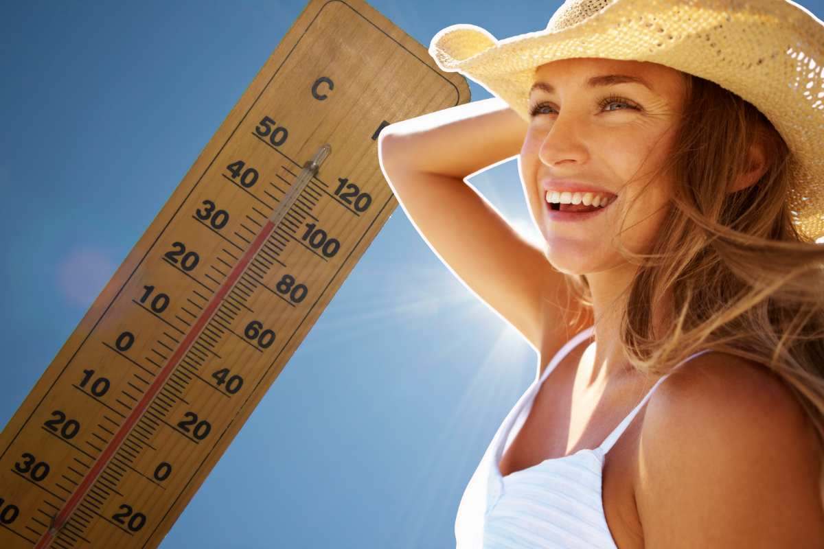 ragazza sorridente con il cappello di paglia e termometro
